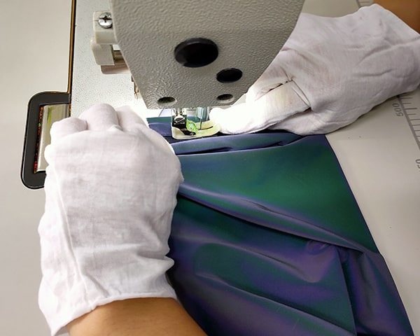 wear gloves to touch the reflective fabric