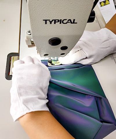 wear gloves to touch the reflective fabric